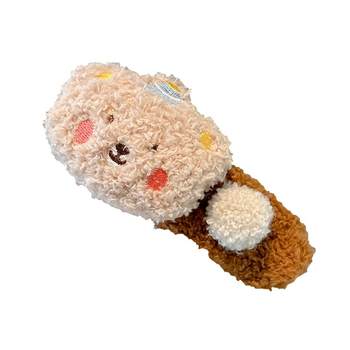 
Plush pudding bear grabbing women's side bangs