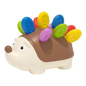 Baby surprise action training to insert building blocks
