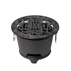 Little happy cast iron barbecue stove to cook tea by the fire