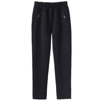 Old lady with velvet pants wears cotton pants in winter
