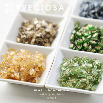 
5 imported Czech beads 12*6mm vintage bay leaves