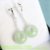 Today's new style, xian yun, is fresh, elegant, versatile, light green, off-centre, safe buckle, jade earrings 
