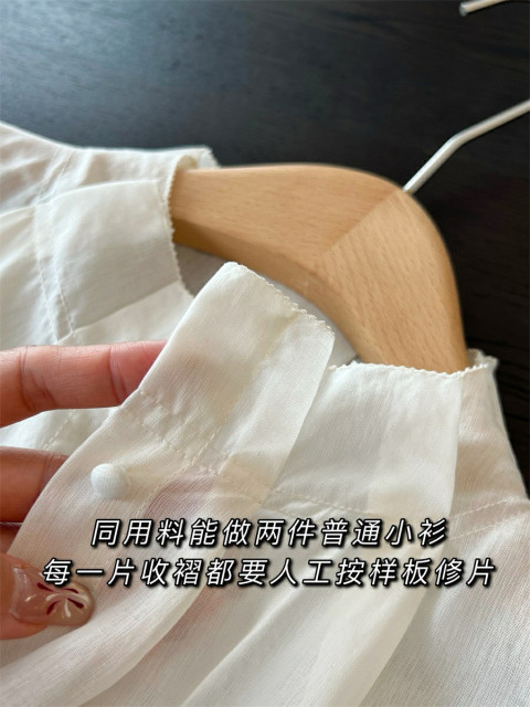 2025 spring and summer new product stand collar French long-sleeved temperament elegant and versatile single-breasted pure white flared sleeve shirt
