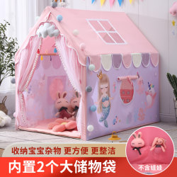 Children's indoor play house boy on bed