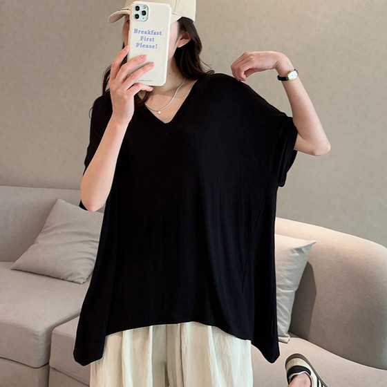 
Spring and summer large-size women's clothing modal wears loose T-shirt V-neck short-sleeved women's irregular thin top solid color base shirt
