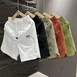 Laser drilling mesh loose breathable quick-drying five-point pants