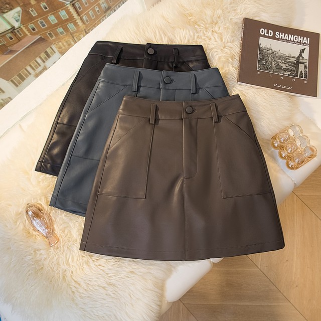 Fashionable pocket PU leather suit skirt for women 2024 autumn and winter versatile high-waisted A-line skirt to make them look slim and short skirt

