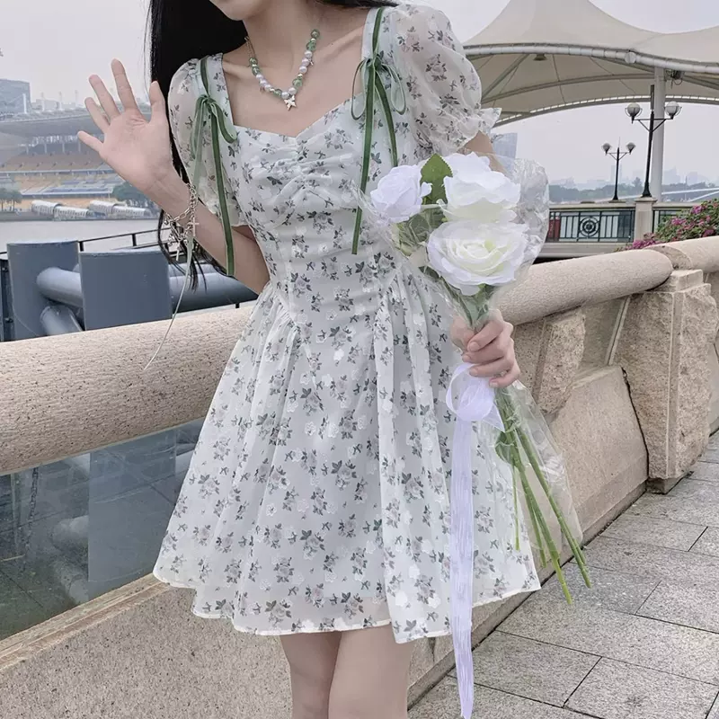 松本丧丧温柔仙女碎花裙子收腰气质短袖淑女山茶花中