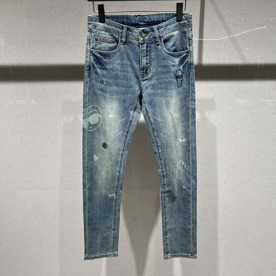 
European station spring and summer men's jeans small feet slimming trendy brand fashion little old man light blue and white casual trousers