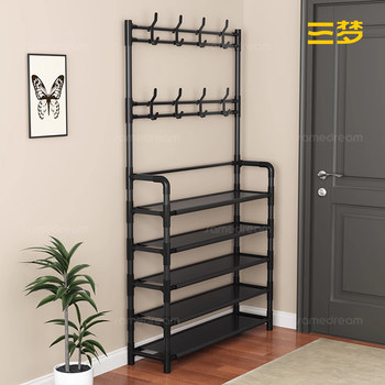 
Door shoe rack integrated against the wall and floor-to-ceiling door in the back bedroom