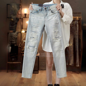 Autumn and winter original high-end washed light blue jeans men's hole patch slim fit small feet elastic trendy brand