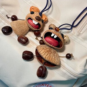 
Cure incisor rat fruit shell bag pendant handmade diy material bag finished plant seeds cute wind chime backpack pendant