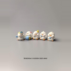 
Bored! Put a bunch of ducks and small animals ornaments to play in mood and stability desktop decoration station to unzip small gifts