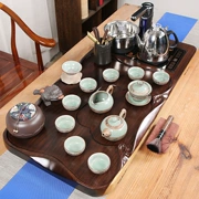 Bộ trà hoàn toàn tự động Bộ hộ gia đình toàn bộ bằng gỗ mun Khay trà bằng gỗ nguyên khối Bàn trà lớn mới phong cách Trung Hoa phòng khách đơn giản