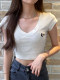 American retro V-neck short-sleeved T-shirt for women in summer chic niche design pure shoulder short sweet hot girl top