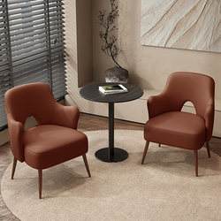 The Balcony Leisure Area Is Decorated with a Small Table and Chairs for Reading, a Three-Piece Set with One Table and Two Chairs, a Coffee Table, and a Sofa Chair Combination