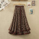 Retro national wind floral skirt female spring and summer new high -waisted large stitching irregular mid -length A -line skirt

