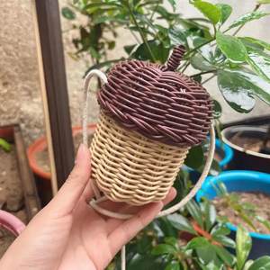 Summer children's cute mini decorative small bag girl rattan editing rubber bag net rubber pine cone woven bag
