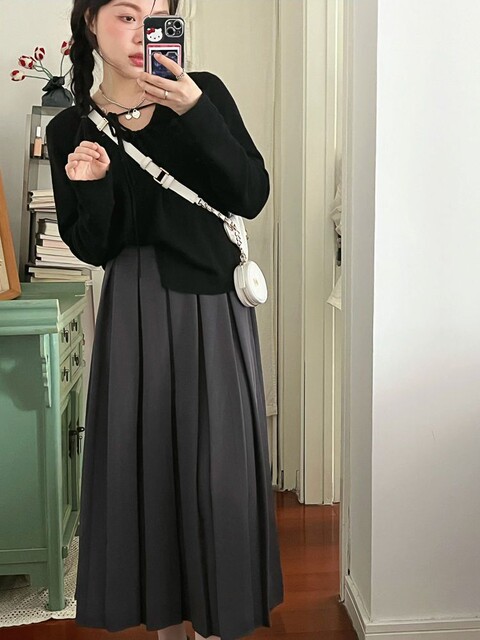 Western temperament high -level vertical pressure pleated suits skirt women autumn and winter retro, big cover leisure A -shaped half body long skirt
