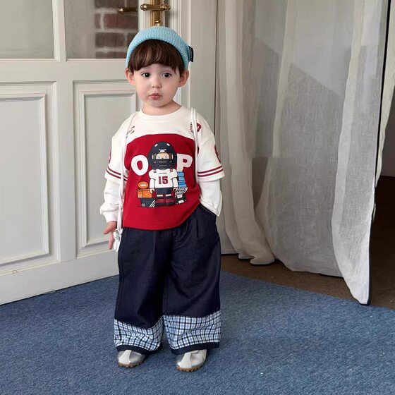 
Spring clothing 2026 new fashionable splicing fake two-piece long-sleeved T-shirts for boys and girls, baby pure cotton tops