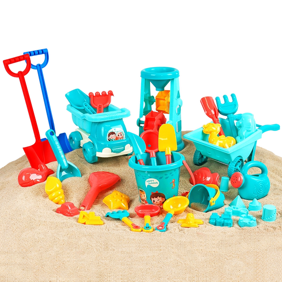 Children playing sand toy sets on the beach baby indoor seaside digging sand, sand, digging shovel barrel sacral sand pool
