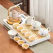 Bộ trà Kung Fu điện gia dụng bếp gốm để pha trà Bàn trà nhỏ xung quanh bếp rót nước hoàn toàn tự động khay trà ấm trà thủy tinh hướng dẫn lắp bàn trà điện