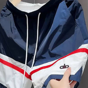 
European-style summer men's sports shorts design color-blocking casual five-point pants beach pants loose straight and handsome