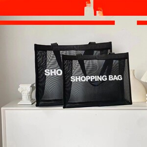 
Large capacity fashion ins mesh handbag leisure shopping travel fitness commuter shoulder bag unisex