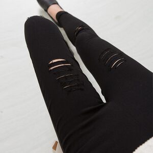 Black high -waisted hole pants wearing wild feet pencil pants thin elasticity summer nine -point pants female