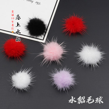 
Price for a pair of antique white hairpin headdress and mink fur balls