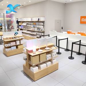 
Mobile phone store display cabinet 3c digital accessories shelf display rack against the wall cashier computer laptop experience desk