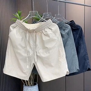 Dirty simple punched summer ice silk fast loose air work five-point pants dry wear-resistant men's penetrating casual shorts
