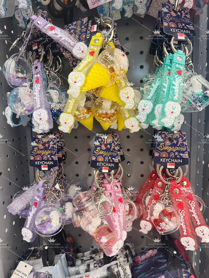 Spot Singapore Airport Travel Souvenirs Souvenirs Quicksand Drifter Bottle Floating Merlion Keychain Hanging Ornaments