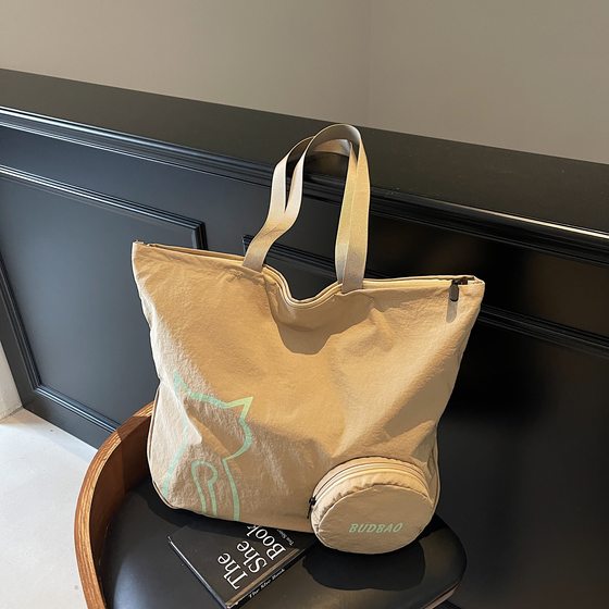 
Large capacity travel bag 2025 new lightweight nylon storage bag fashionable foldable shoulder bag versatile tote bag