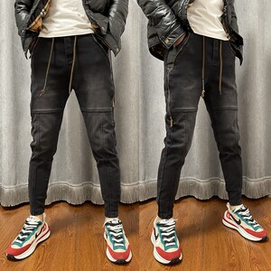 
Autumn and winter style spliced personalized jeans with side zipper decoration casual pants Korean style slimming trendy harem pants