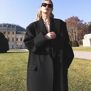 Black woolen jacket for women 2025 autumn and winter new Korean version lengthened thick loose silhouette high-end woolen coat