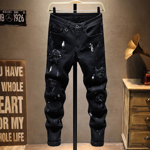 
Autumn and winter European and American new high-end trendy brand motorcycle style jeans for men with splash ink slim fit small feet stretch black holes