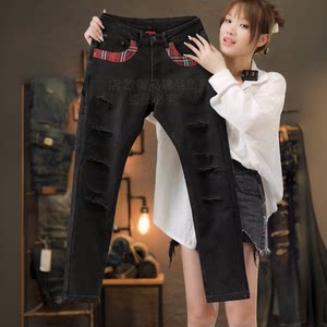 Autumn and winter original high-end personalized splicing hole patch black men's jeans slim fit small feet elastic trendy brand