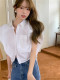 French sleeveless white shirt for women in summer new high-end design niche loose temperament waist-hugging short top