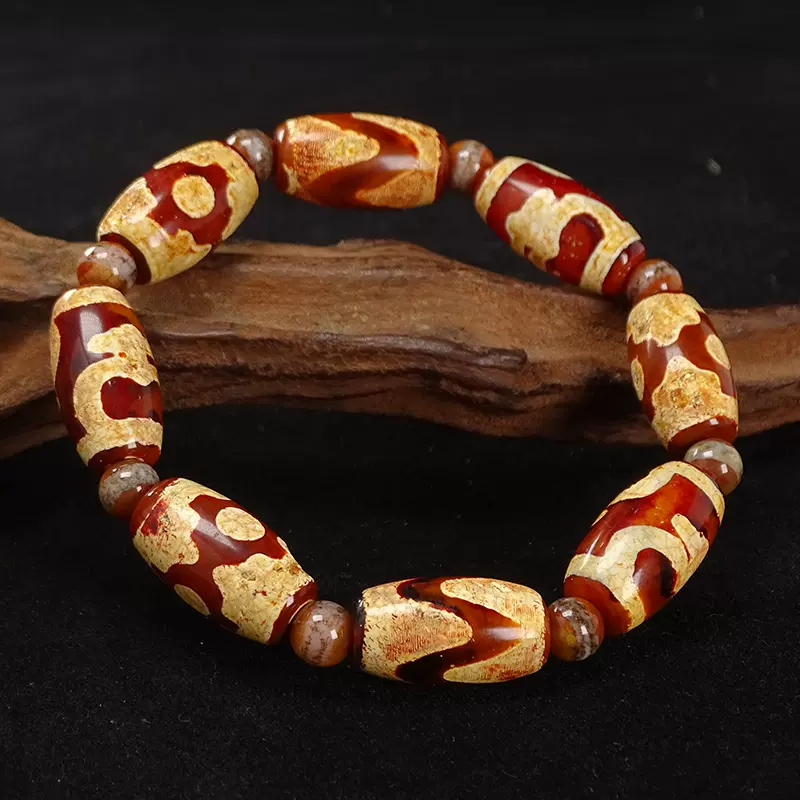 5A级红肉金沁钙化西藏天然玛瑙宝瓶三眼虎牙天