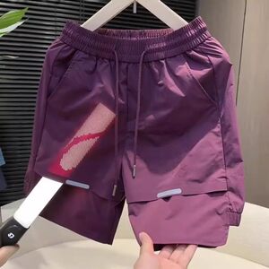 
New summer laser punched casual shorts men's trendy splicing versatile ice silk breathable sports quick-drying pants