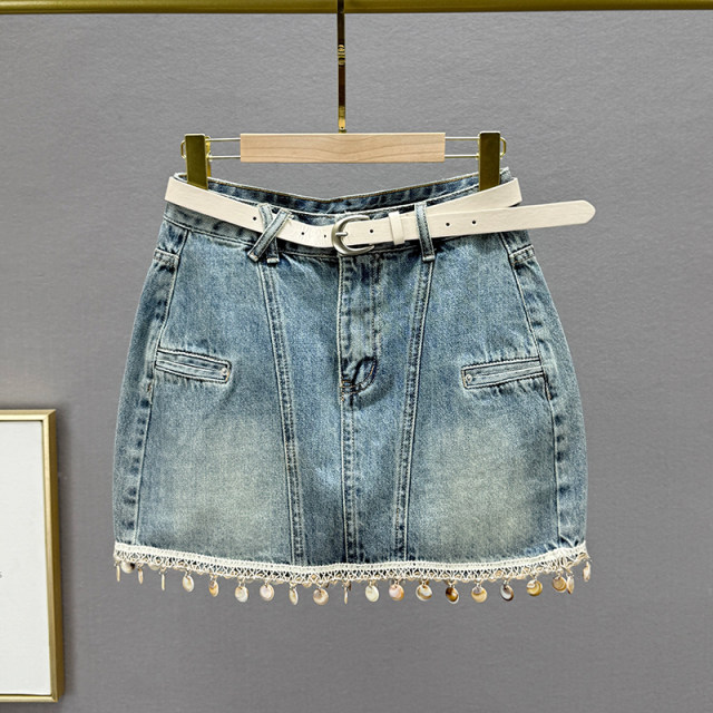 Retro old denim skirt women's short skirt 2025 summer new high-waisted slim tassel A-line hip skirt