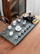 Bộ trà hoàn chỉnh, khay trà đá vân gỗ biển gia đình kung fu trà, bàn pha trà đá vàng đen, phòng khách hoàn toàn tự động