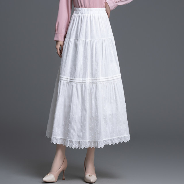 White skirt umbrella skirt for women 2025 spring new French spliced ​​lace edge cover hips and slimming cake skirt long skirt