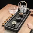 Nhật Bản đơn giản hộ gia đình khay trà đá vàng đen cung cấp nước tự động bếp gốm điện bếp trà tích hợp bộ trà kung fu văn phòng