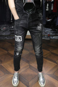 
Autumn and winter fashion street trend mainstream black printing heavy industry washing stone mill slim feet high elastic comfortable jeans men