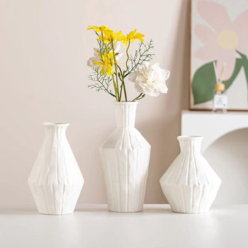 
Unfired matte white ceramic flower vase