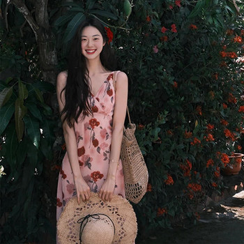 ເກາະ resort ແບບຫາດຊາຍ v-neck suspender skirt ການເດີນທາງ Yunnan ໃສ່ແມ່ຍິງເຫມາະ sunset skirt seaside dress