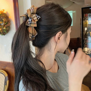 
British Academy style bow ponytail clip