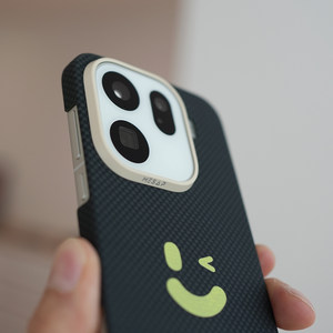 
AMU Liangpin MESAP fiber shadow is suitable for OPPO Find x9 Pro smiley face and wink Kevlar aramid fiber ultra-thin personalized original design contrasting color mobile phone protective case magnetic attraction